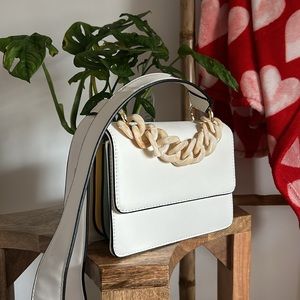 Melie Bianco White Crossbody Bag with Chain Detail